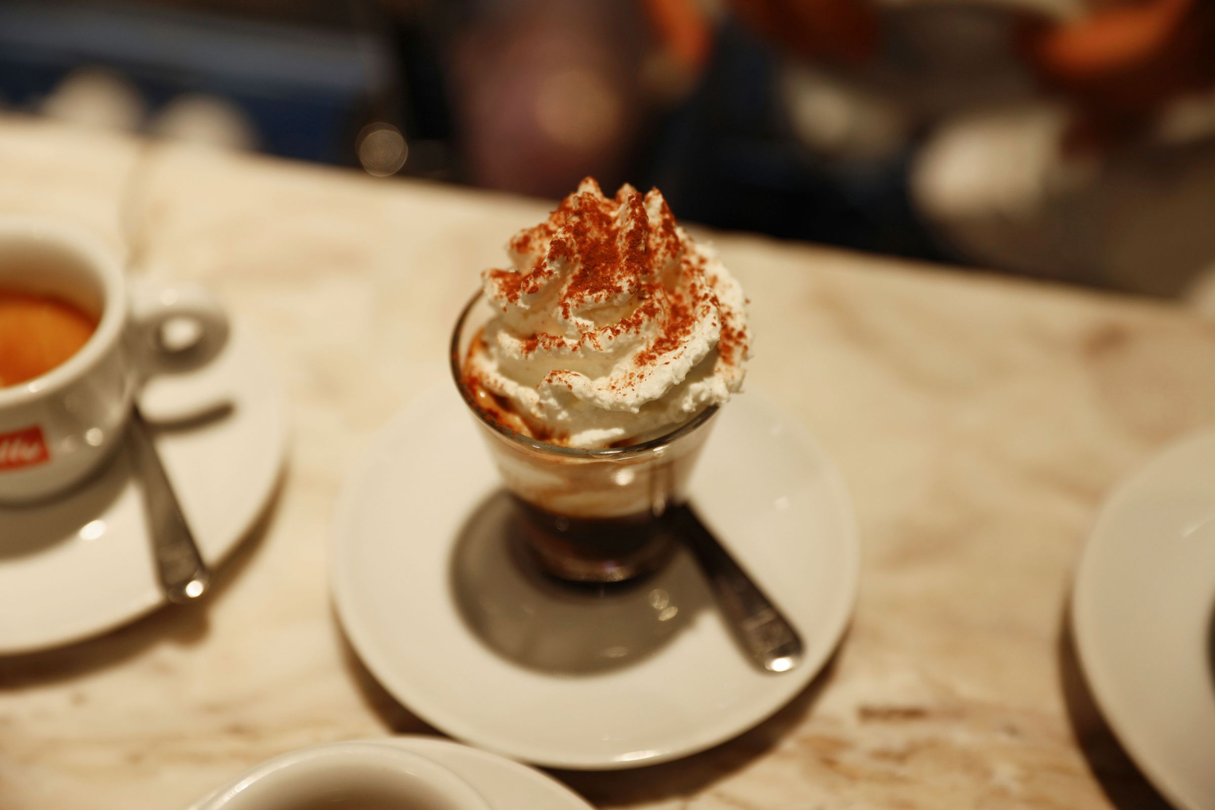 Espresso coffee topped with whipped cream
