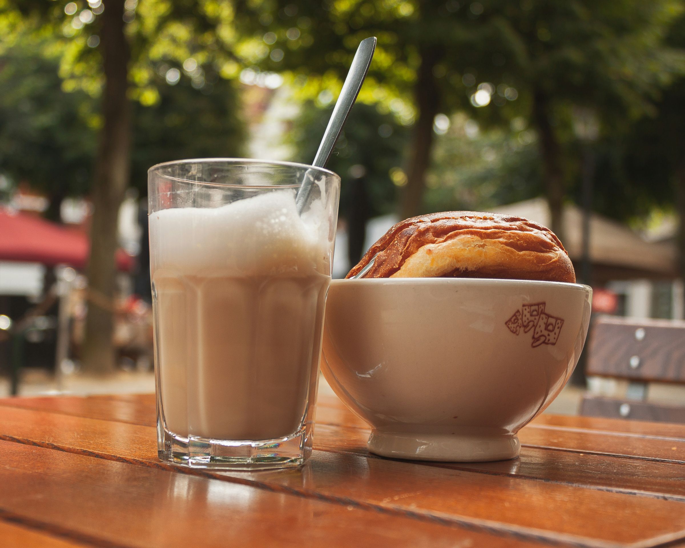 Portuguese coffee with steamed milk in a glass